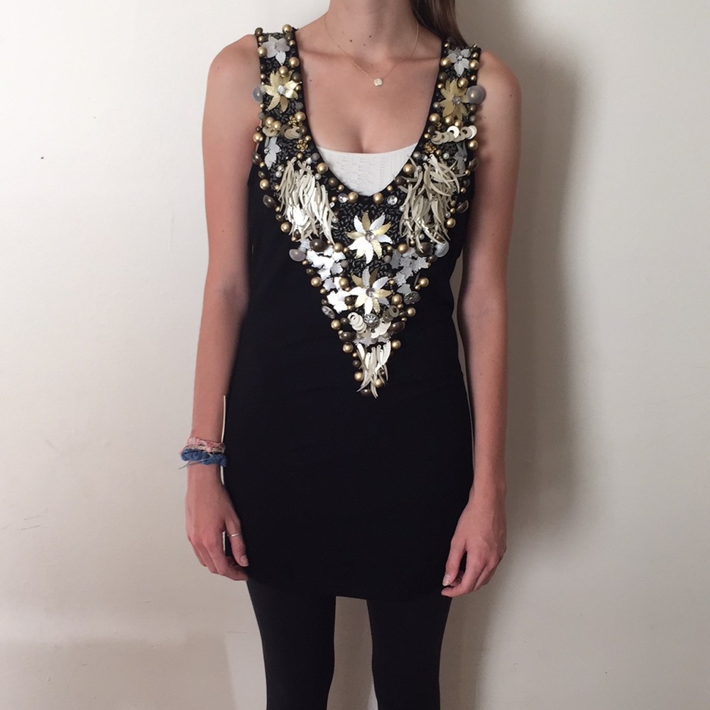 Stunning black low cut shirt with charms